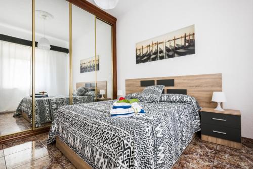 Posteľ alebo postele v izbe v ubytovaní Apartamento Segalerva Centro