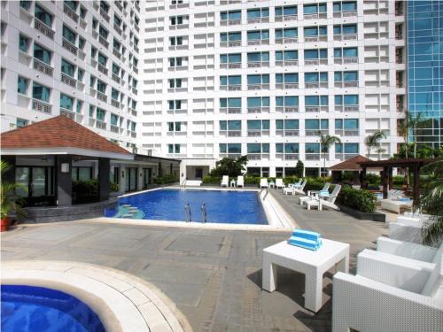 Bazén v ubytování Quest Serviced Residences nebo v jeho okolí