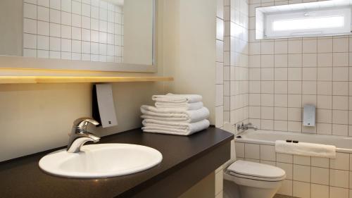 Ein Badezimmer in der Unterkunft Hotel Kronjylland