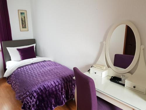 Postel nebo postele na pokoji v ubytování Hotel Hölscher
