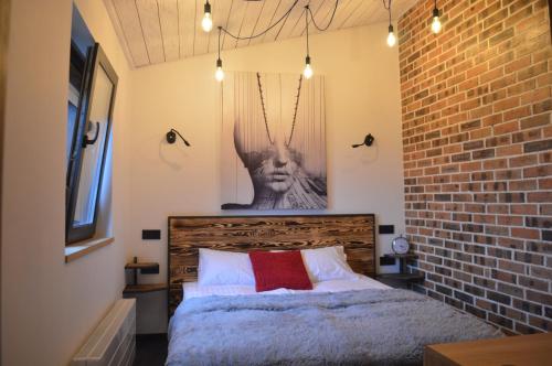 מיטה או מיטות בחדר ב-Air Loft Apartment