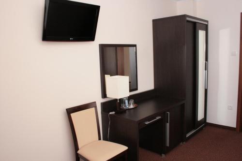 Hotel Martexにあるテレビまたはエンターテインメントセンター