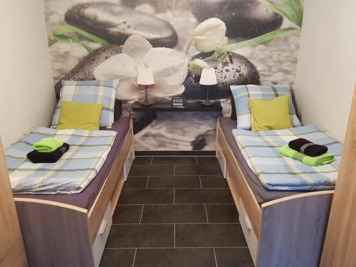 Postel nebo postele na pokoji v ubytování Appartement Stein EG