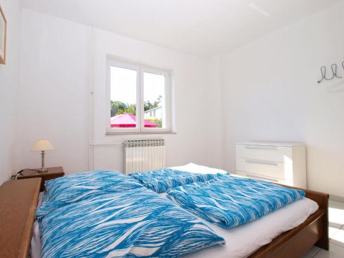Posteľ alebo postele v izbe v ubytovaní Apartments Zorka 1421