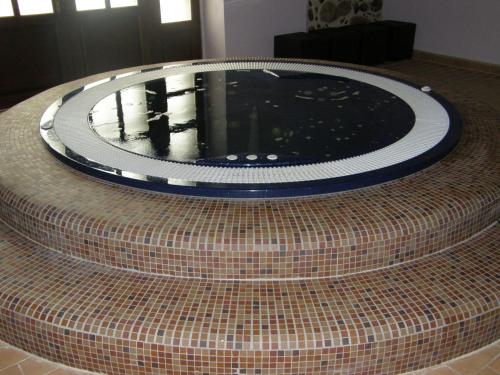 a large roundabout in a room with at Vecgulbenes muiža in Gulbene