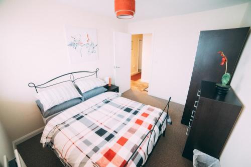 En eller flere senge i et værelse på City centre penthouse apartment