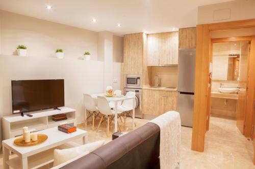 Кухня или мини-кухня в Apartamentos Boutique Salamanca
