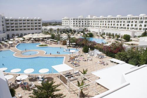 an aerial view of a resort with two pools at El Mouradi El Menzah in Hammamet