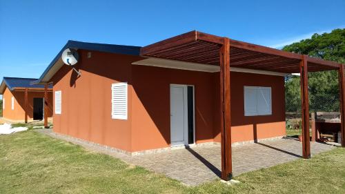 a model of a small house with a roof at Cabañas Ceferino in Federación