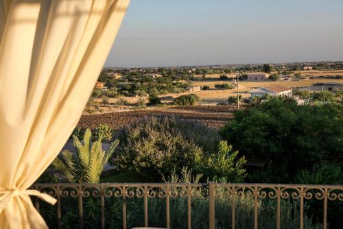 a view from the balcony of a house at Agriturismo Il Granaio Hotel & SPA in Modica