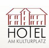 a logo for a hotel with two houses at Hotel am Kulturplatz in Rastatt