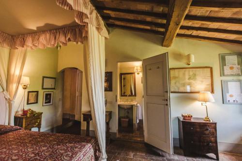Voodi või voodid majutusasutuse La Veronica Exclusive Chianti Resort toas