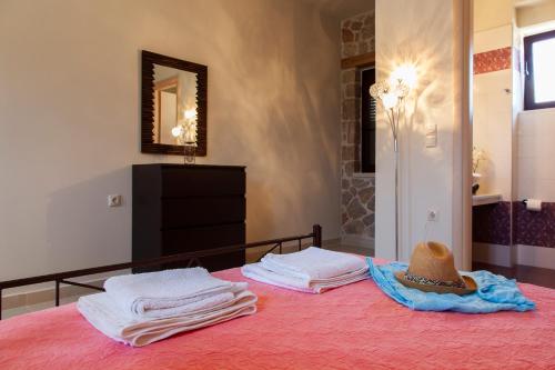 Postel nebo postele na pokoji v ubytování Key Villas