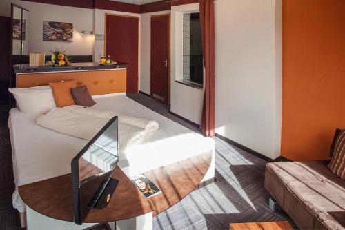 
Ein Bett oder Betten in einem Zimmer der Unterkunft Hotel Lifestyle
