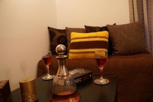 Zona de estar de Nancy Rooms