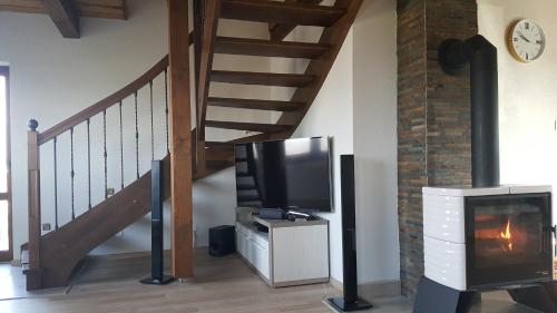 TV a/nebo společenská místnost v ubytování Wellness Chata Tatry
