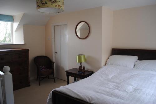 Postel nebo postele na pokoji v ubytování The Old Reading Room