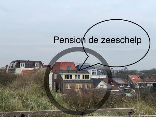 a view of a city with the words permission do zoscoxin at Pension de Zeeschelp in Domburg