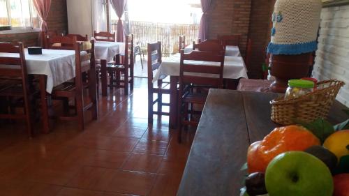 Restaurant ou autre lieu de restauration dans l'établissement Pousada Portal