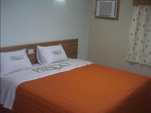 Кровать или кровати в номере Hotel do Prado