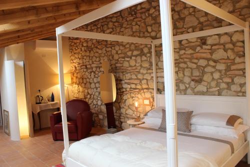 Postel nebo postele na pokoji v ubytování Corte Tre Vigne