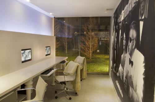 Yoo Punta del Este - Rental Club Apartmentsにあるテレビまたはエンターテインメントセンター