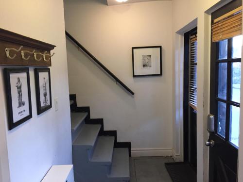 a staircase in a house with a stair case at L'Hotel Particulier Griffintown in Montréal