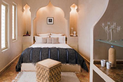 เตียงในห้องที่ Riad Cocoon