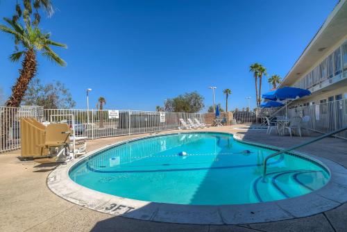 a swimming pool in the middle of a building at Motel 6-Rancho Mirage, CA - Palm Springs in Rancho Mirage