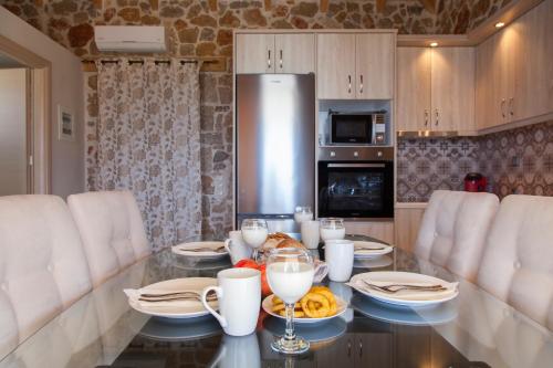 Kuchyň nebo kuchyňský kout v ubytování Key Villas