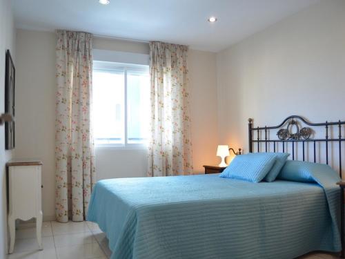 Säng eller sängar i ett rum på APCOSTAS - Torre del Mar Playa