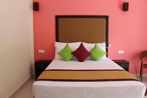 Postel nebo postele na pokoji v ubytování Organic Garden Resort Sigiriya