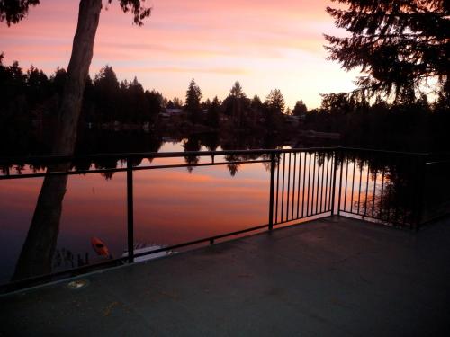 a view of a body of water at sunset at Cycle Inn Bed and Breakfast in Langford