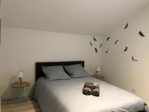 Cama ou camas em um quarto em ALBI HOME - Rochegude