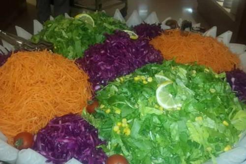 a plate filled with different types of vegetables at Hotel Dream Of Side in Side