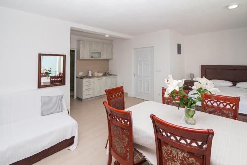 Postel nebo postele na pokoji v ubytování Open Sea Apartments