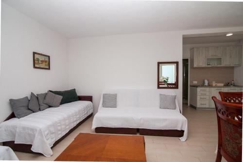 Postel nebo postele na pokoji v ubytování Open Sea Apartments