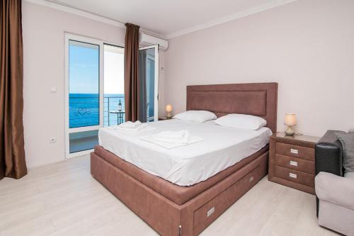 Postel nebo postele na pokoji v ubytování Open Sea Apartments