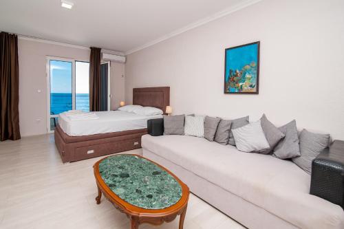 Postel nebo postele na pokoji v ubytování Open Sea Apartments