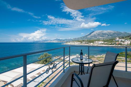 a balcony with a view of the ocean at Open Sea Apartments in Utjeha