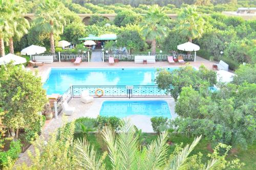 an overhead view of a swimming pool in a resort at Almounia Hotel & Spa in Taroudant