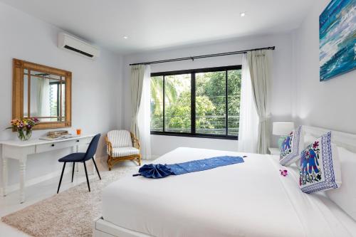 Ένα ή περισσότερα κρεβάτια σε δωμάτιο στο Kamala Beach House - 1 min walk to beach