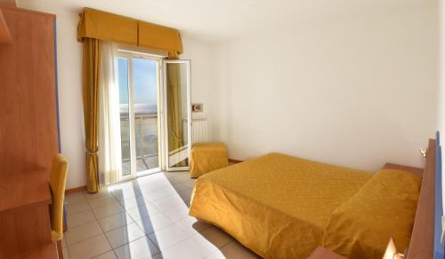 Кровать или кровати в номере Hotel Villa Olga