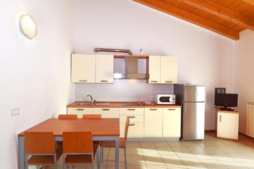 Кухня или мини-кухня в Hotel Villa Olga
