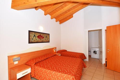 Кровать или кровати в номере Hotel Villa Olga