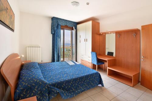Кровать или кровати в номере Hotel Villa Olga