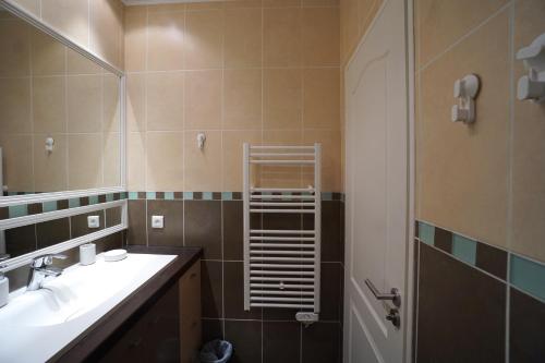 a bathroom with a sink and a shower at Apartment with parking in Nice near the harbor in Nice