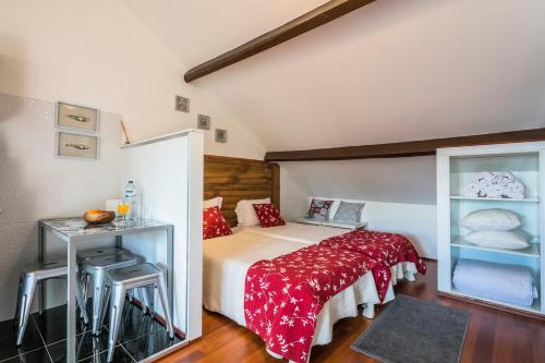 Ένα ή περισσότερα κρεβάτια σε δωμάτιο στο Apartamento À Francos Attic