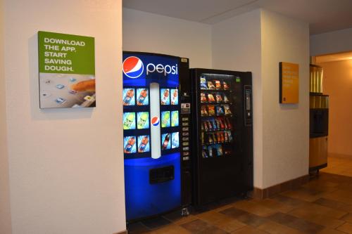 a pepsi vending machine next to a wall at Motel 6-Anderson, IN in Anderson