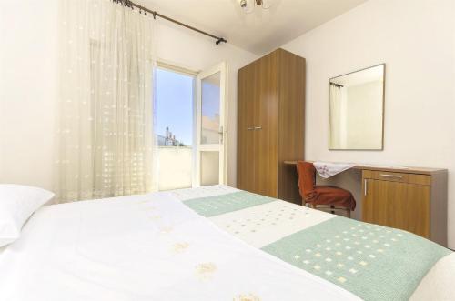 Postel nebo postele na pokoji v ubytování Apartment Niko